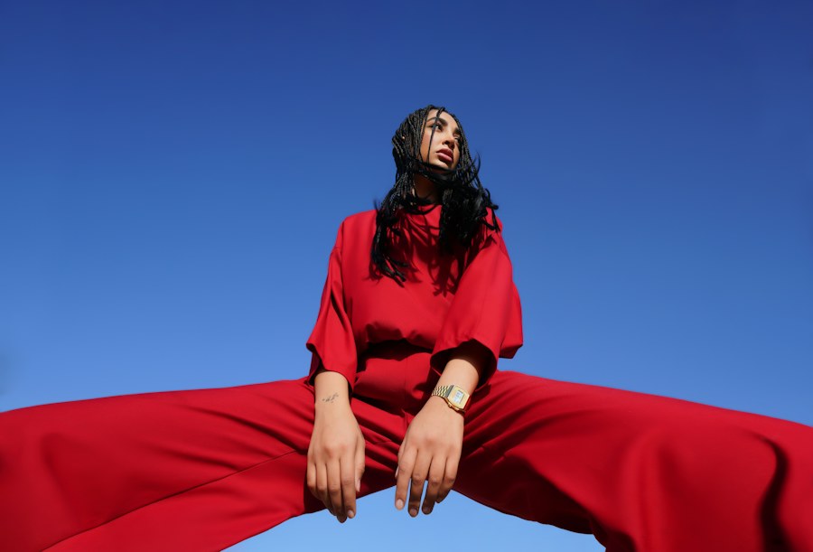 A red-toned editorial portrait for the Noir wardrobe theme